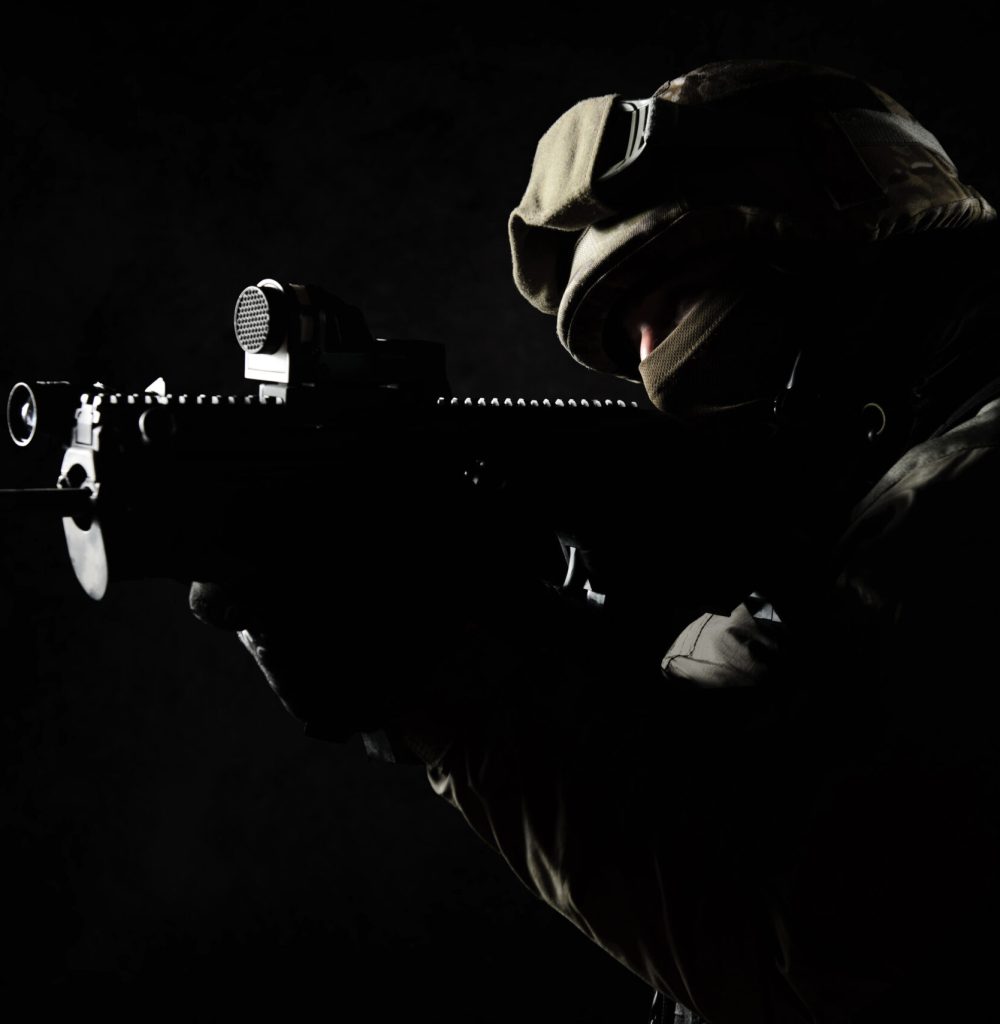 The man in the image of a member of the SWAT police with weapons